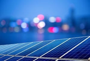 Solar panels and city lights for renewable energy